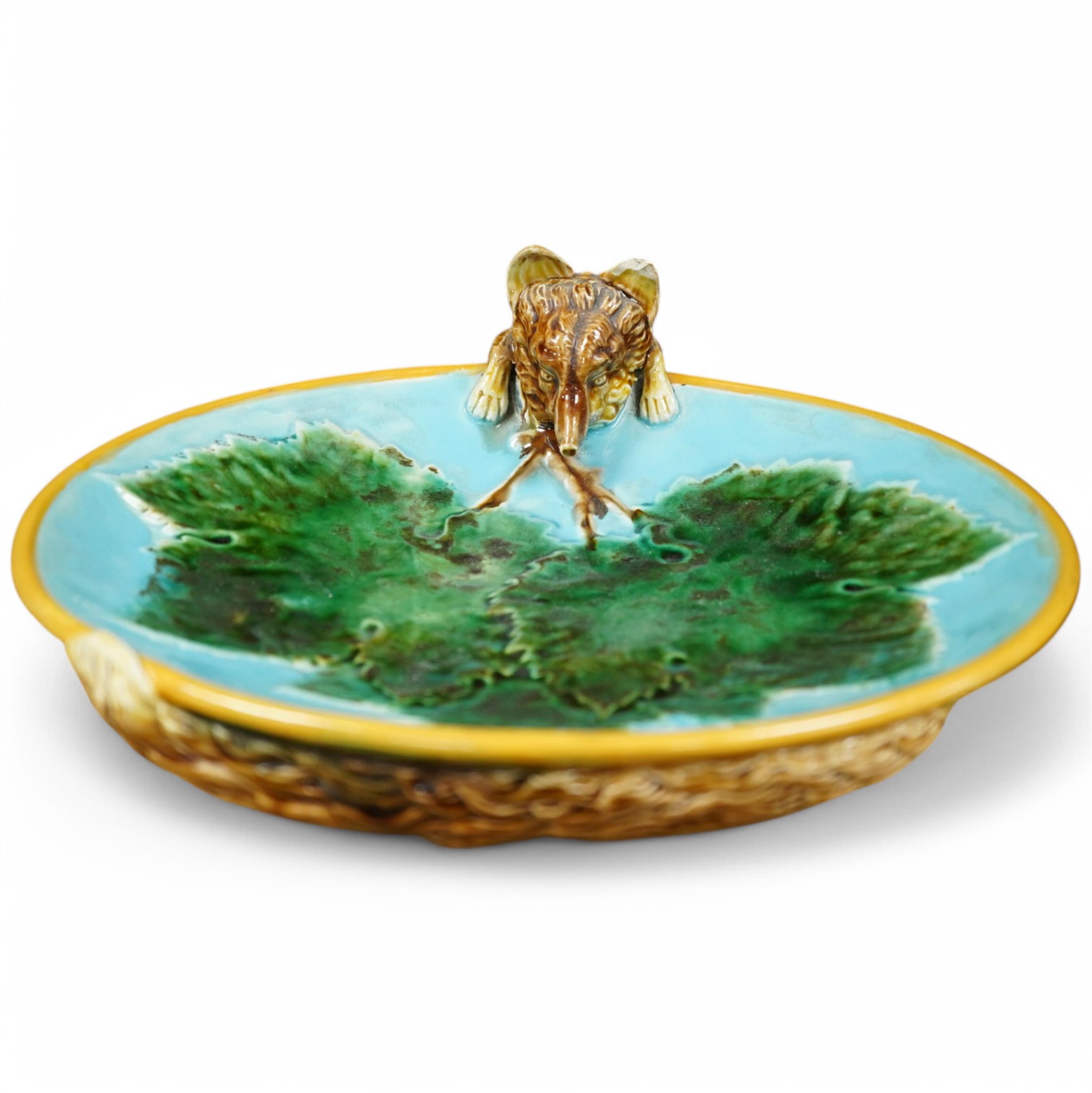 George Jones, a Victorian majolica ‘fox’ dish, 25cm wide. Condition - fair to good